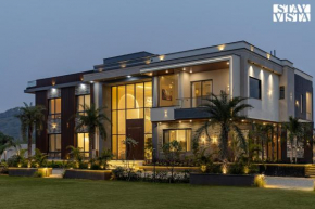 StayVista at Priana - A luxury Pool Villa with Jacuzzi & Gym